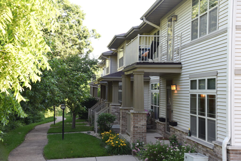 Rockery Pointe condo units with view of sidewalk and buildings